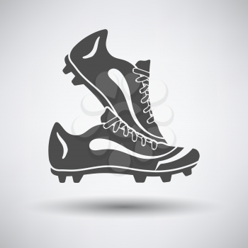 Soccer pair of boots  icon on gray background with round shadow. Vector illustration.