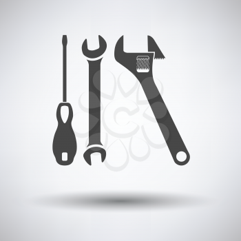 Wrench and screwdriver icon on gray background, round shadow. Vector illustration.