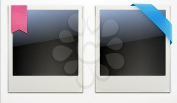 Vector illustration of two blank retro polaroid photo frames over white background 