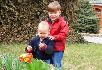 Royalty Free Photo of Two Little Boys Playing