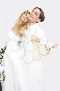 Royalty Free Photo of a Couple Posing on Wedding Day