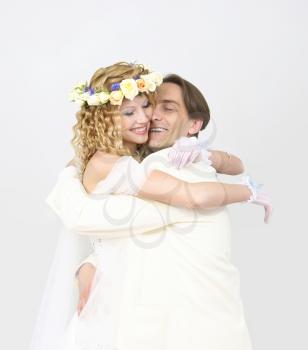 Royalty Free Photo of a Couple Hugging on Their Wedding Day
