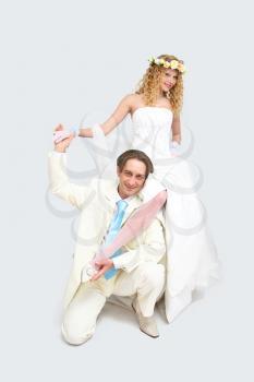 Royalty Free Photo of a Couple Posing on Wedding Day