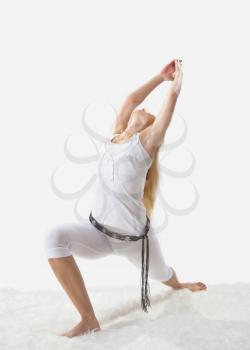 Royalty Free Photo of a Woman Performing Yoga