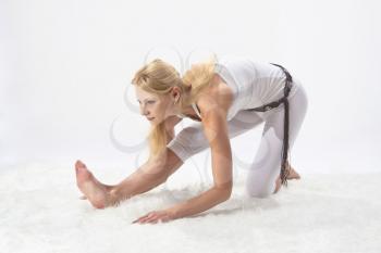 Royalty Free Photo of a Woman Performing Yoga