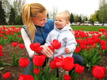 Royalty Free Photo of a Mother and Son in a Garden