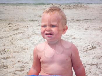 Royalty Free Photo of a Little Boy at the Beach