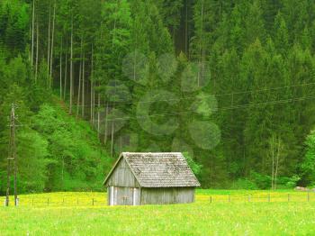 Royalty Free Photo of a Barn in a Field