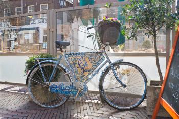 Bicycle advertising cafe in Delft,  Netherlands