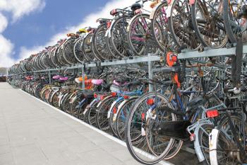 Plenty bicycles at parking lot in 