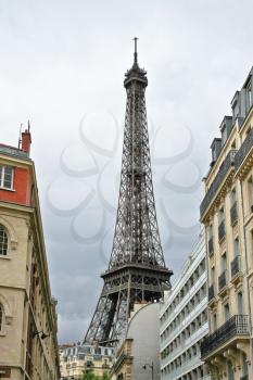 The Parisian street against Eiffel Tower in Paris. France