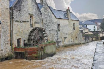 Old mill on river in the town of Bayeux. Normandy, France