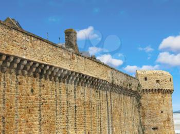 Fortress wall the abbey of Mont Saint Michel. Normandy, France 