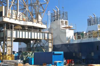 Crane and ship under construction at the shipyard
