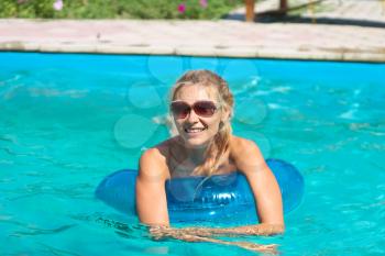 Royalty Free Photo of a Woman in a Pool