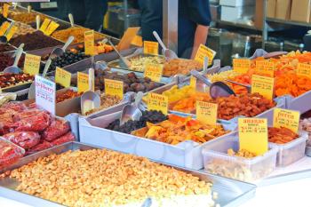 Sale of dried fruits and nuts on the market
