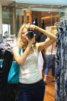 Girl photographs at the mall