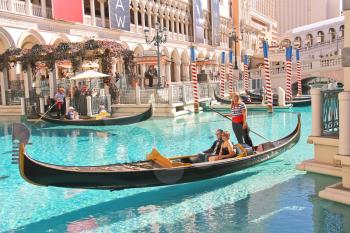 LAS VEGAS, NEVADA, USA - OCTOBER 20 : Gondola rides in Venetian  Hotel on October 20, 2013 in Las Vegas, The resort opened on May 3, 1999. One of the most luxurious hotels in Las Vegas