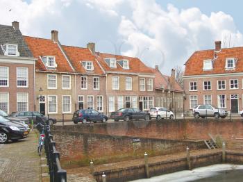 HEUSDEN,THE NETHERLANDS - FEBRUARY 18, 2012 : Cars on a pier in the Dutch town of Heusden. The city is located in the province of North Brabant