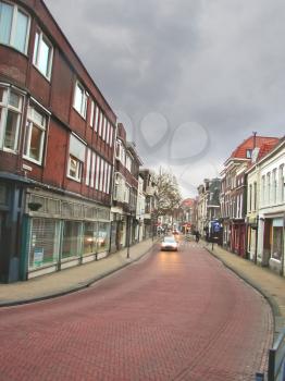 GORINCHEM, THE NETHERLANDS - FEBRUARY 17, 2012 :On the streets of the Dutch city of Gorinchem. Netherlands.  The city is located in the province of South Holland. Population - about 33,000 people