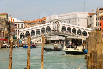 VENICE, ITALY - MAY 06, 2014: Tourists on the Rialto Bridge in Venice, Italy
