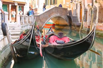 VENICE, ITALY - MAY 06, 2014: Gondola Service on the canal in Venice, Italy