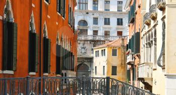 Beautiful houses on a narrow street in Venice, Italy