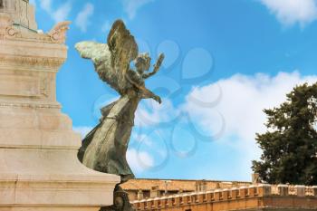 Statue of a winged woman in the monument to Victor Emmanuel II. Piazza Venezia, Rome
