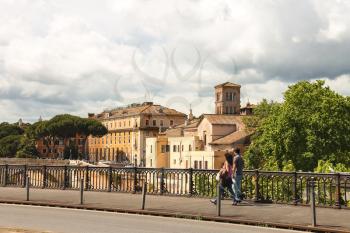 ROME, ITALY - MAY 03, 2014: People on the bridge across the Tiber in Rome, Italy