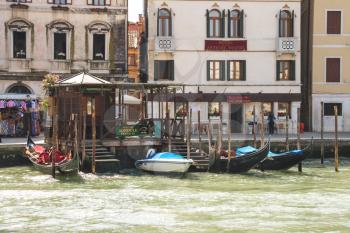 VENICE, ITALY - MAY 06, 2014: Gondola Service on the canal in Venice, Italy 