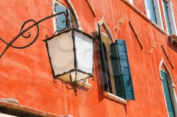 Lantern on the facade of old  italian house. Venice 