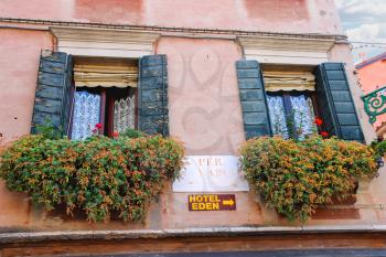 VENICE, ITALY - MAY 06, 2014: Facade of the house on the street in Venice, Italy