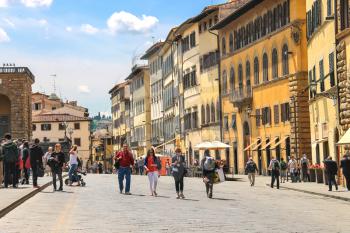 FLORENCE, ITALY - MAY 08, 2014: Tourists on a sloping square before the Palace Pitti