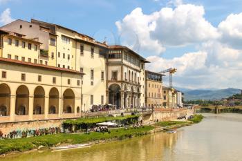FLORENCE, ITALY - MAY 08, 2014: Quay of the river Arno of the ancient Italian city Florence. Florence - the administrative center of the region of Tuscany. Population of more than 373,000 people