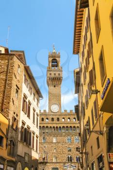 FLORENCE, ITALY - MAY 08, 2014: View of the Palazzo Vecchio from the Florence of city streets