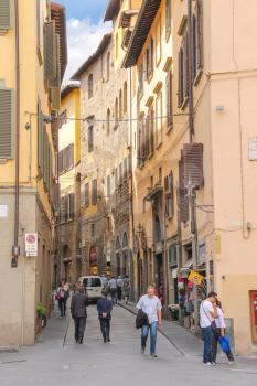 FLORENCE, ITALY - MAY 08, 2014: People on the street of the ancient Italian city Florence. Florence - the administrative center of the region of Tuscany. Population of more than 373,000 people 