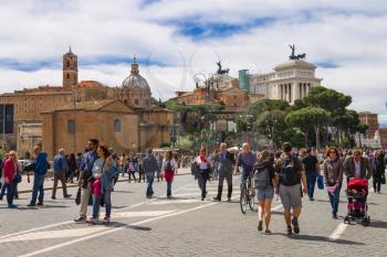 ROME, ITALY - MAY 04, 2014: Tourists visiting the sights in a historical part town  in Rome, Italy