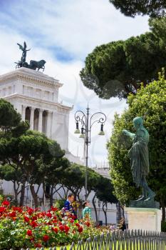 ROME, ITALY - MAY 04, 2014: Tourists in park near  the monument to Victor Emmanuel II. Piazza Venezia, Rome  , Italy