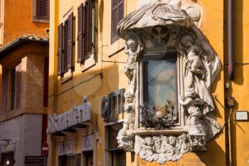 ROME, ITALY - MAY 04, 2014: Tabernacle at the intersection of Via della Dataria and Via di S. Vincenzo  in Rome, Italy