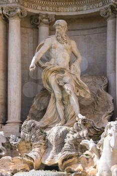 Statue of Neptune at the Trevi Fountain in Rome, Italy
