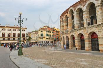 VERONA, ITALY - MAY 7, 2014: People in the area near Verona Arena in preparation for the annual festival of opera