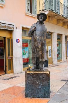 VERONA, ITALY - MAY 7, 2014: Monument to the poet Roberto Tiberio Barbarani, alias Berto Barbarani in Verona, Italy