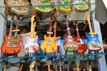 SAN MARINO. SAN MARINO REPUBLIC - AUGUST 08, 2014: Copies of famous musicians guitars are sold at the gift shop in San Marino. The Republic of San Marino