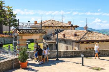 SAN MARINO. SAN MARINO REPUBLIC - AUGUST 08, 2014: Tourists on the observation deck a restaurant Nido del Falco in San Marino. The Republic of San Marino