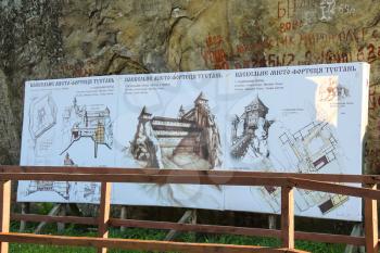 Village Urych , Lviv region. Ukraine - July 1, 2014 : Signboard in the historical and cultural reserve Tustan. On the signboard reads: The mountain town - fortress Tustan