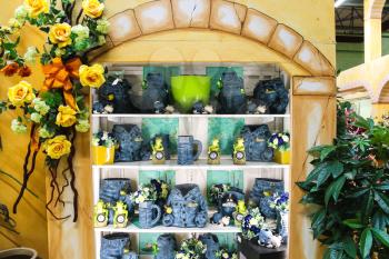Taneto, Italy - December 22, 2014: Decorative items for the garden in the mall Mondoverde. Taneto, Italy