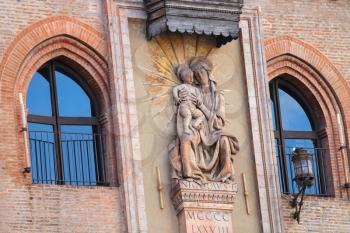 Statue of the Madonna (Niccolo del Arca) on the facade Palazzo Comunale in Bologna. Italy