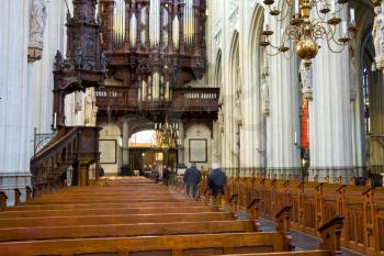 Den Bosch, Netherlands - January 17, 2015: People in the cathedral Dutch city of Den Bosch