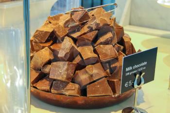 Chunks of milk chocolate on display cafes
