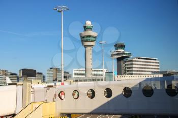 View the control tower and other buildings from the window of the airport